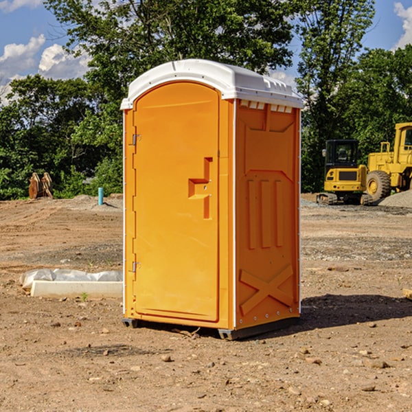 how often are the porta potties cleaned and serviced during a rental period in Pike